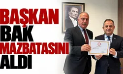 Başkan Bak mazbatasını aldı